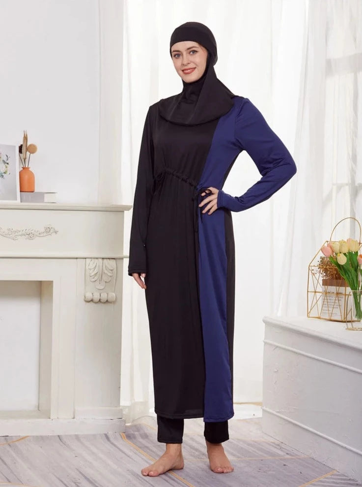 muslim girl wearing black blue burkini