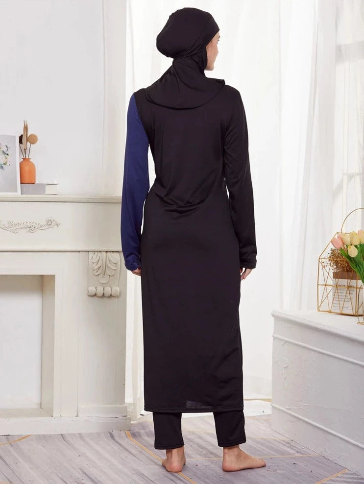 girl showing the back side for black burkini