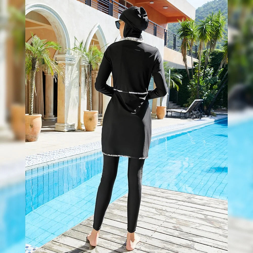 Black Eagle model wearing Full Coverage Swimwear