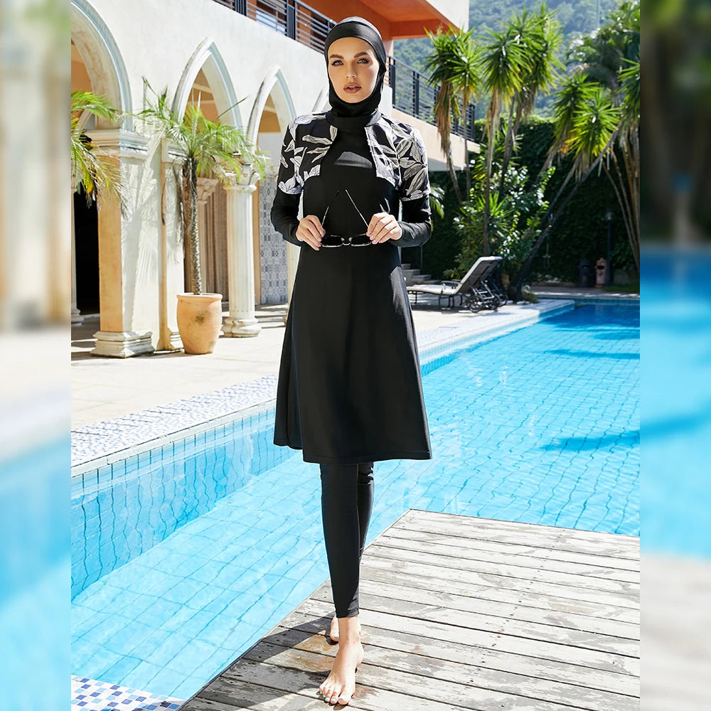 muslim girl wearing black with white top flowers hijab burkini